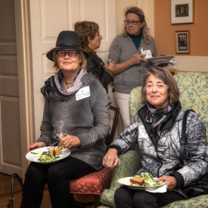Elizabeth Olson Goldring Piene (left) and Peggy Printz. In the background, Sylvia Fubini (left) talksto Sarah James de Besche